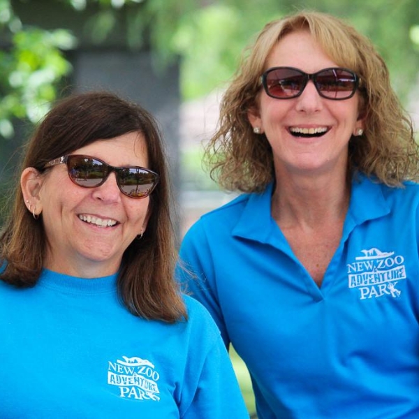 Two Volunteers Smiling